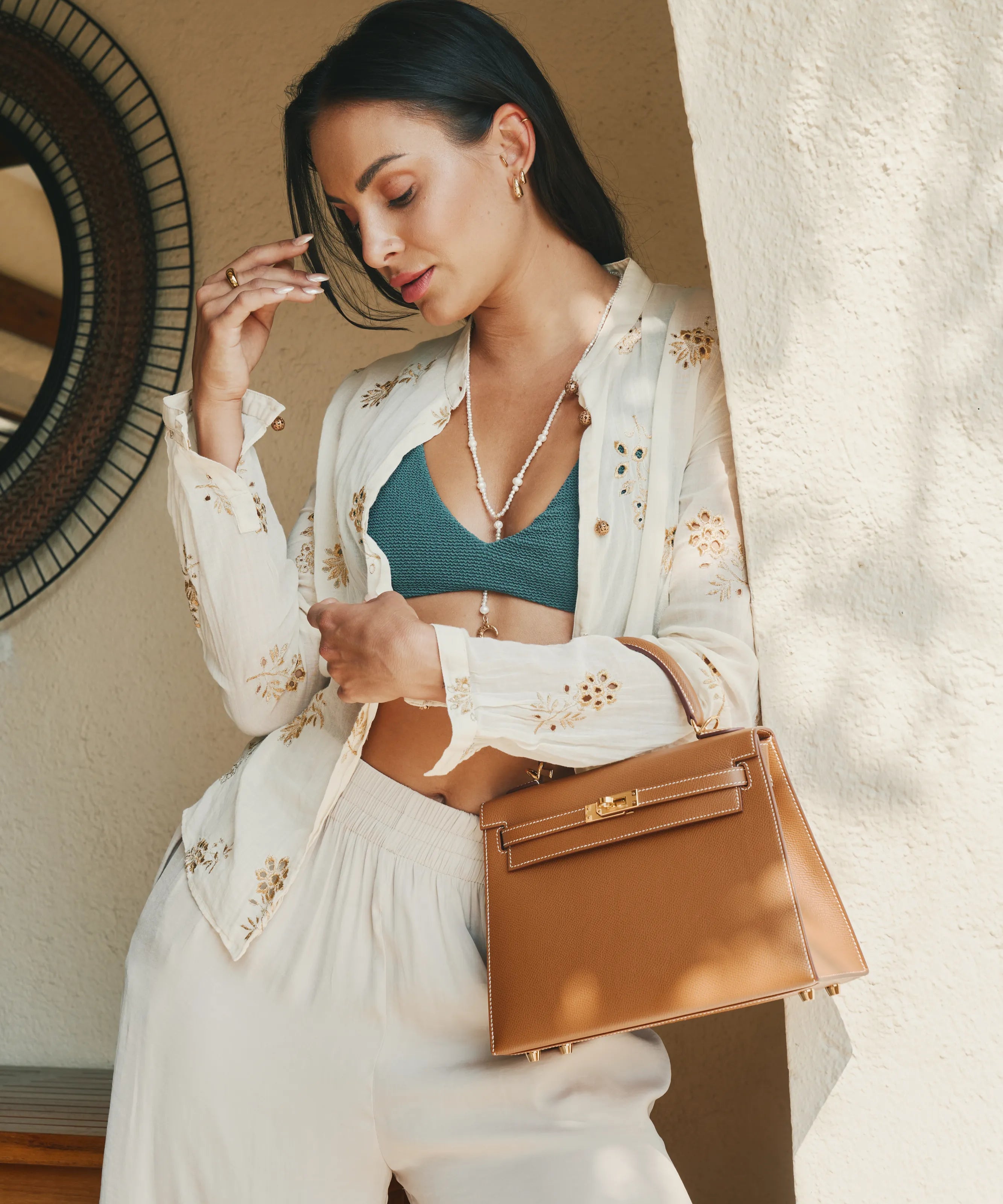 Hermès Kelly bag styled in Selectif’s summer campaign