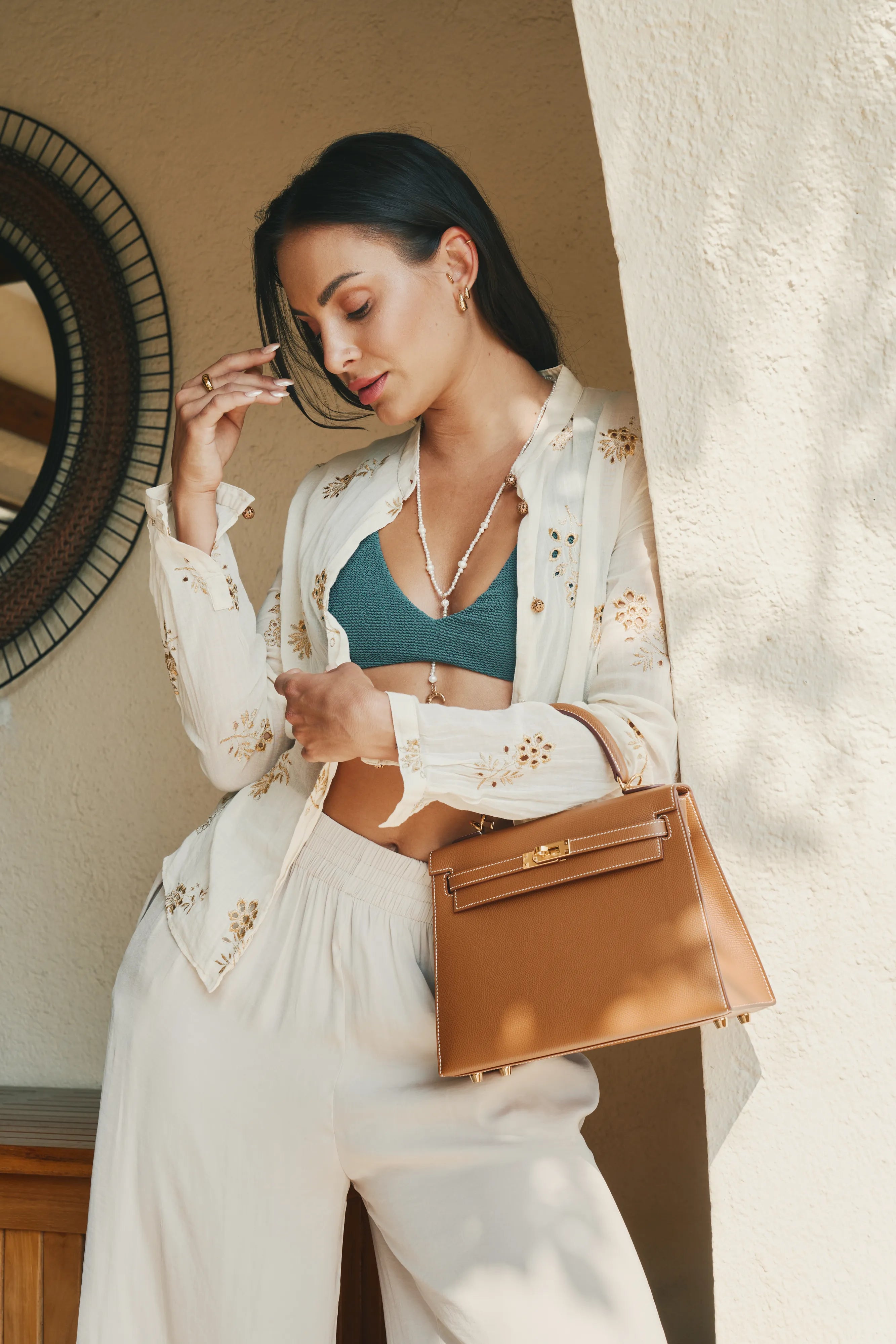 Hermès Kelly bag styled in Selectif’s summer campaign