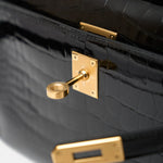 Hermès Kelly Pochette Black Shiny Alligator GHW