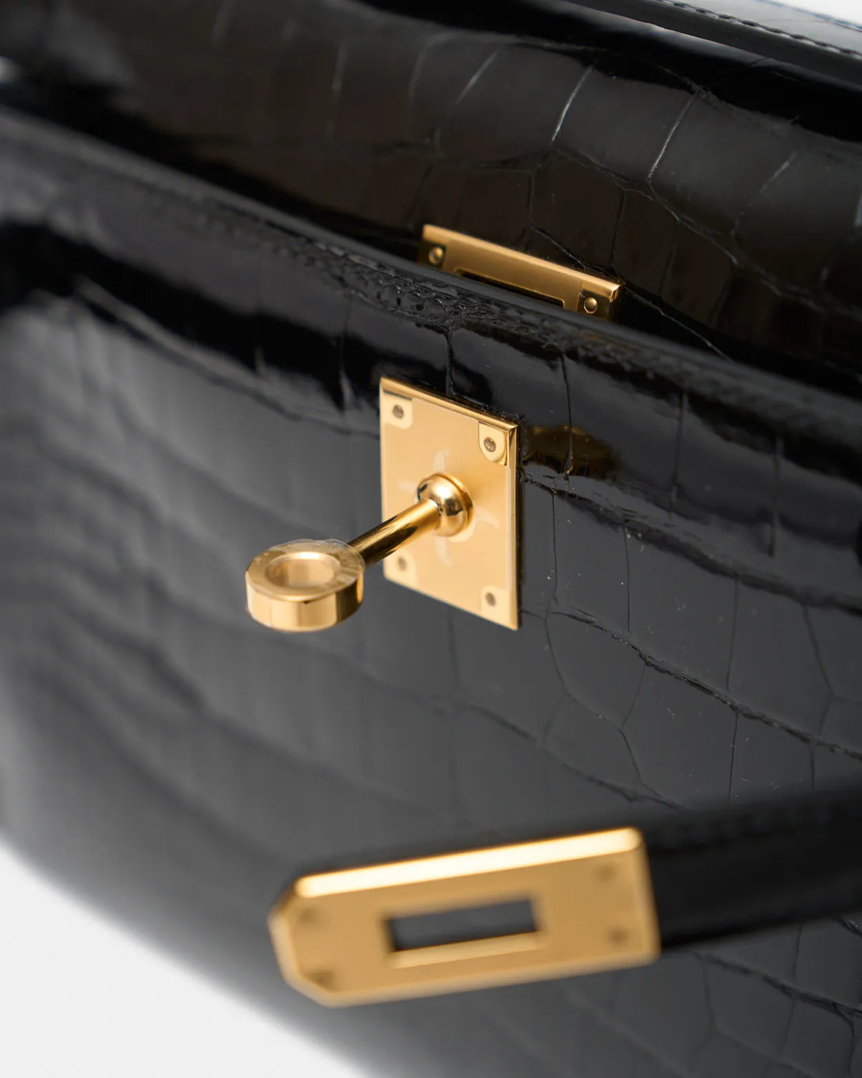 Hermès Kelly Pochette Black Shiny Alligator GHW