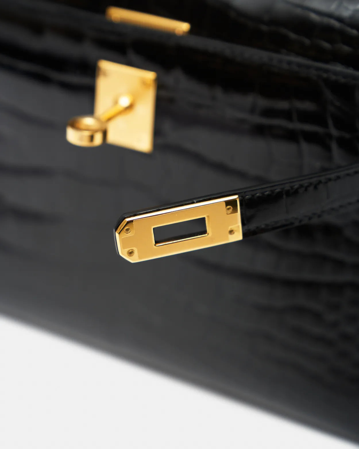 Hermès Kelly Pochette Black Shiny Alligator GHW