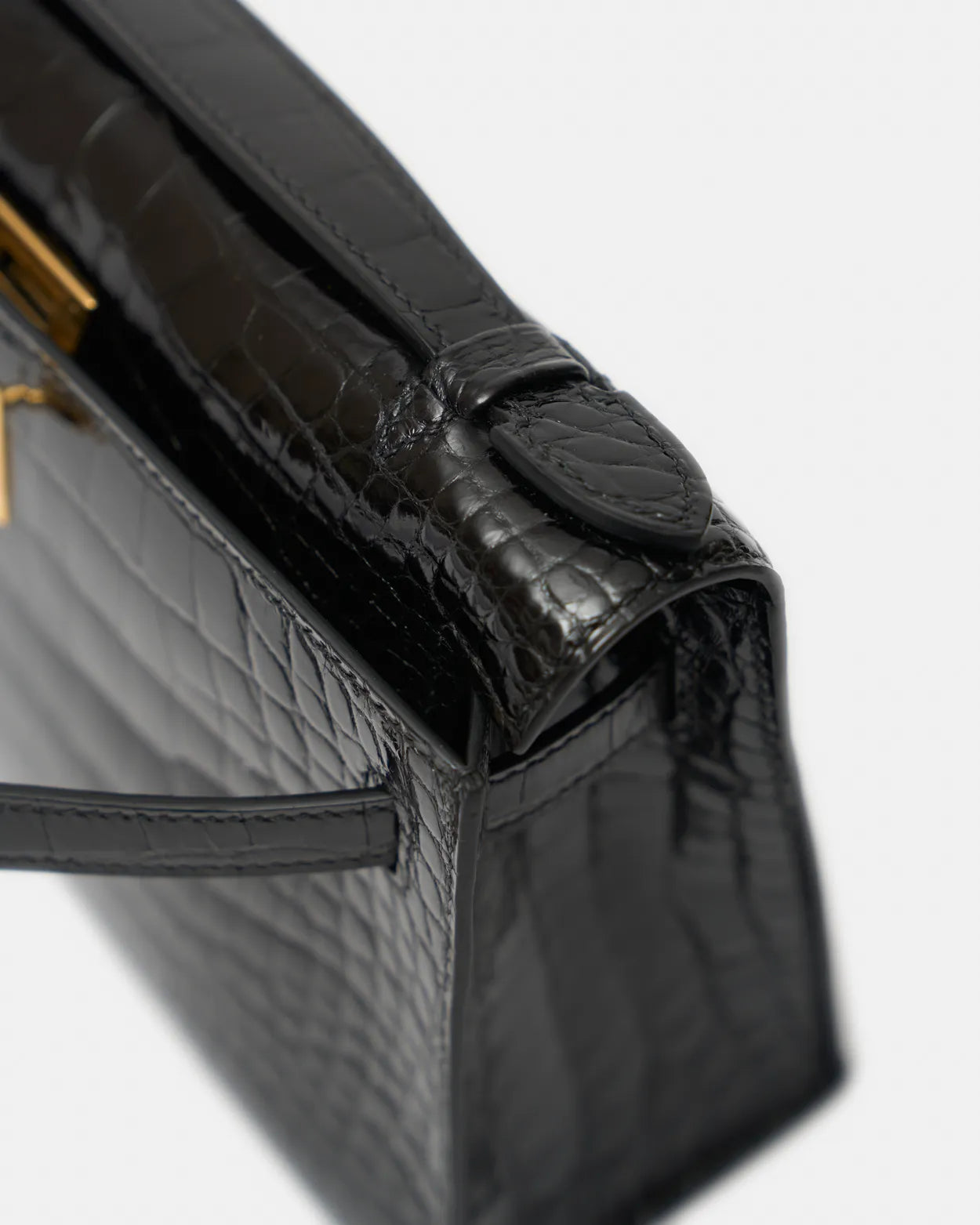 Hermès Kelly Pochette Black Shiny Alligator GHW