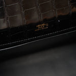 Hermès Kelly Pochette Black Shiny Alligator GHW