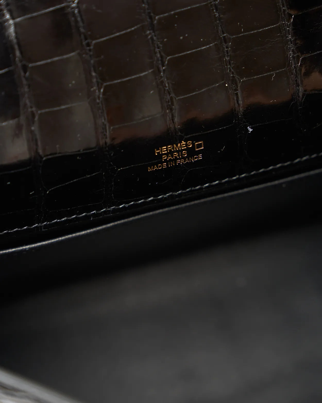 Hermès Kelly Pochette Black Shiny Alligator GHW