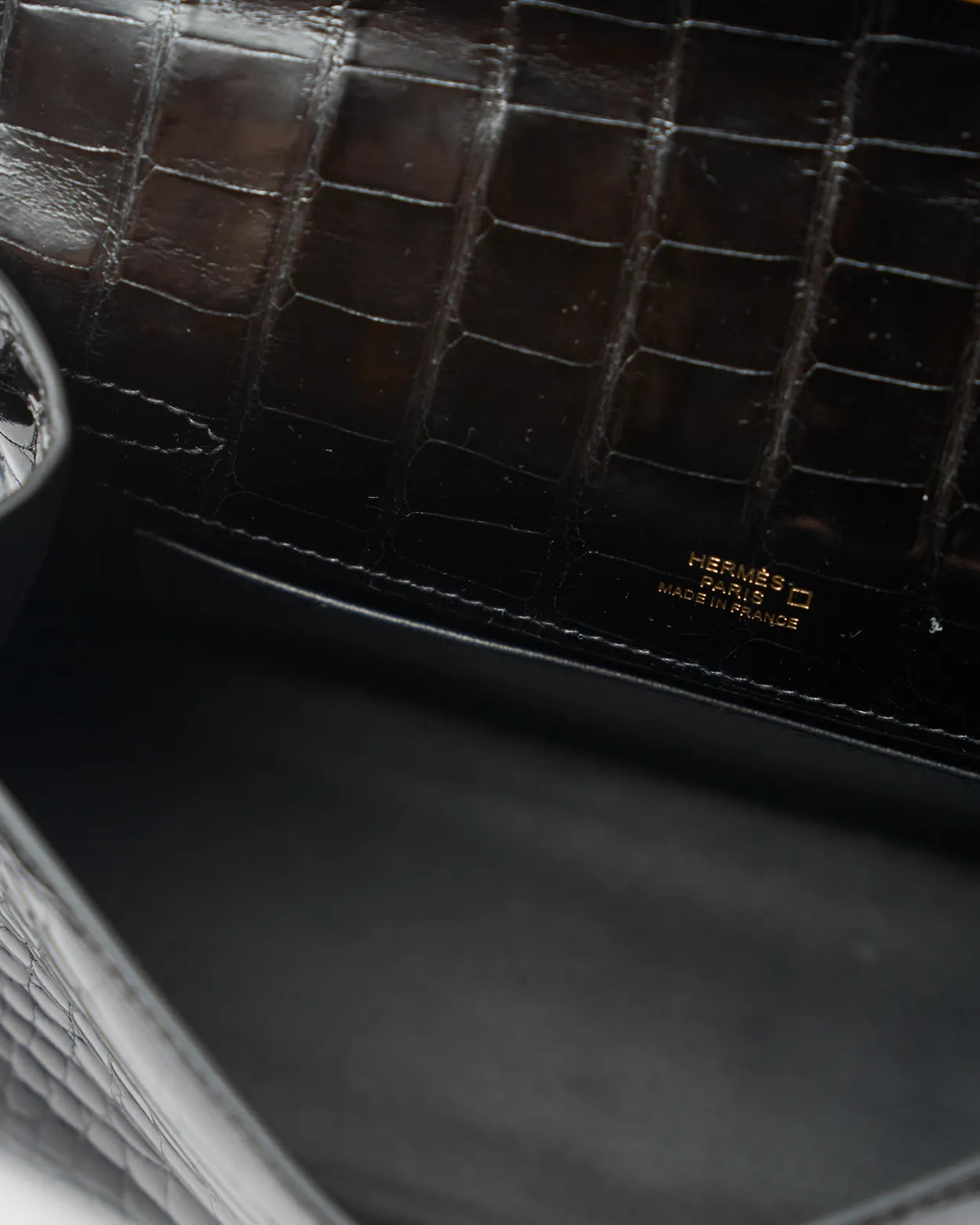 Hermès Kelly Pochette Black Shiny Alligator GHW