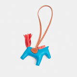 Hermès Grigri Rodeo Horse Bleu Zanzibar/Rose Texas/Gold PM