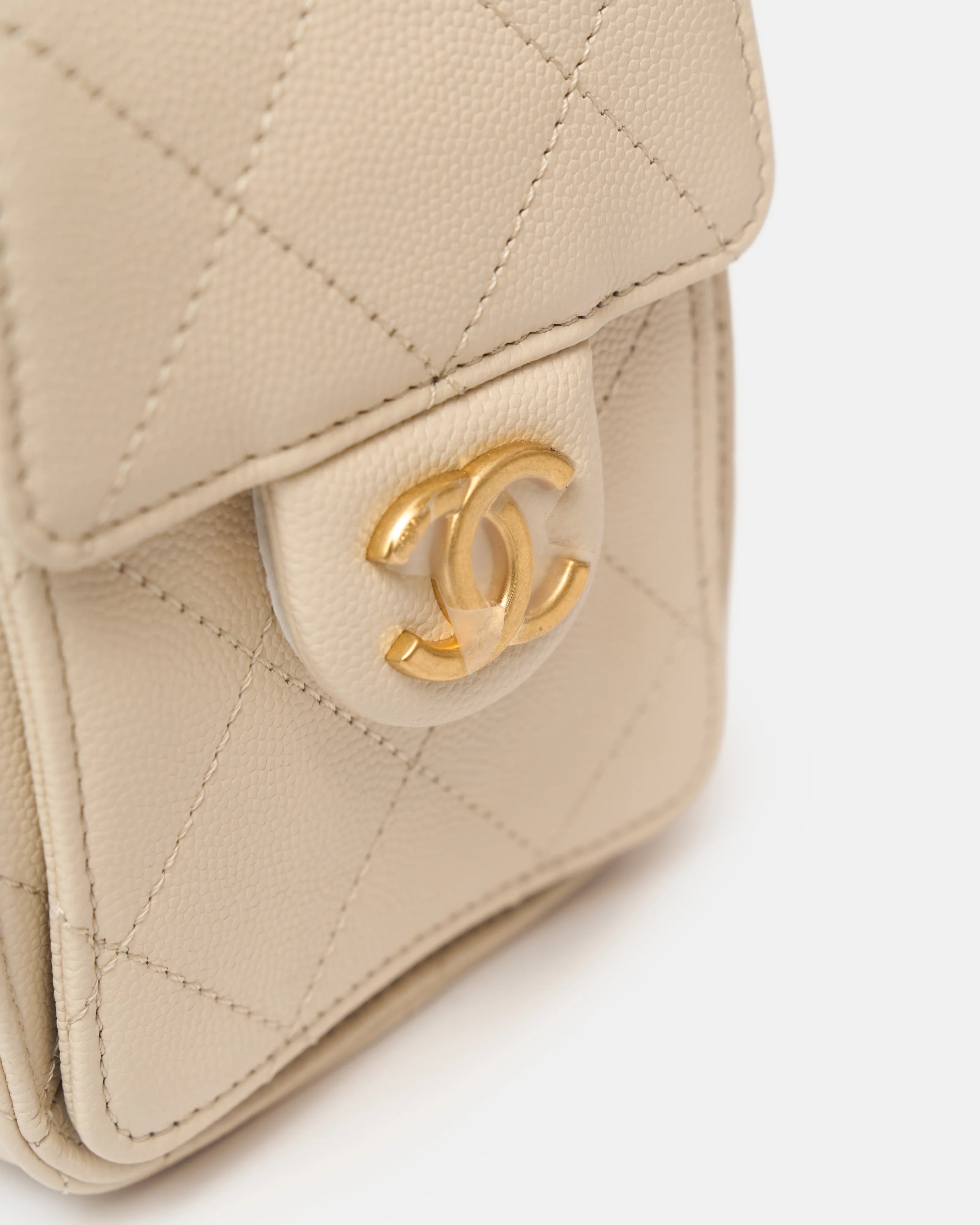 Chanel 25 shoulder bag in beige color and grained calfskin material in GHW 