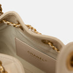 Chanel 25 shoulder bag in beige color and grained calfskin material in GHW 