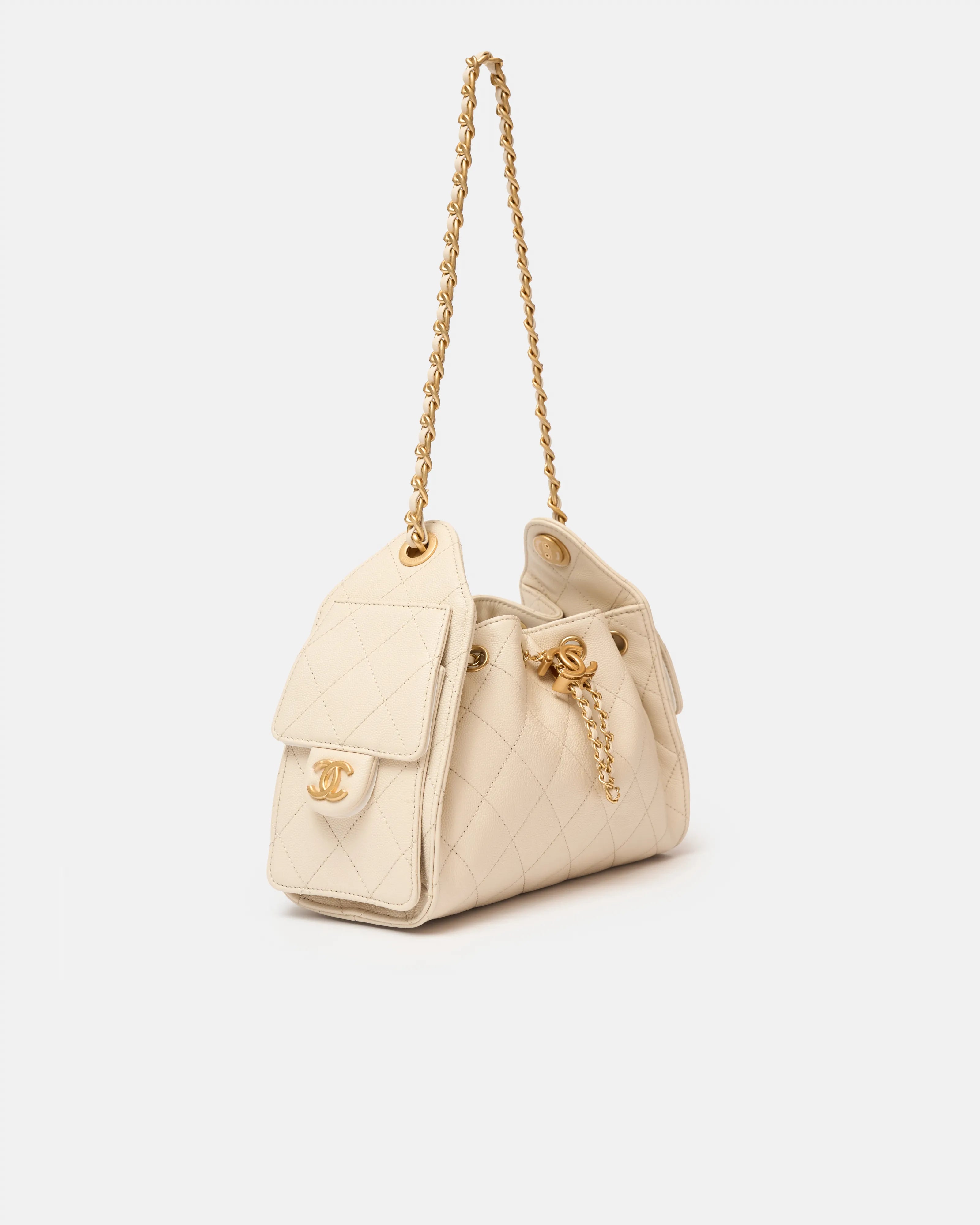 Chanel 25 shoulder bag in beige color and grained calfskin material in GHW 