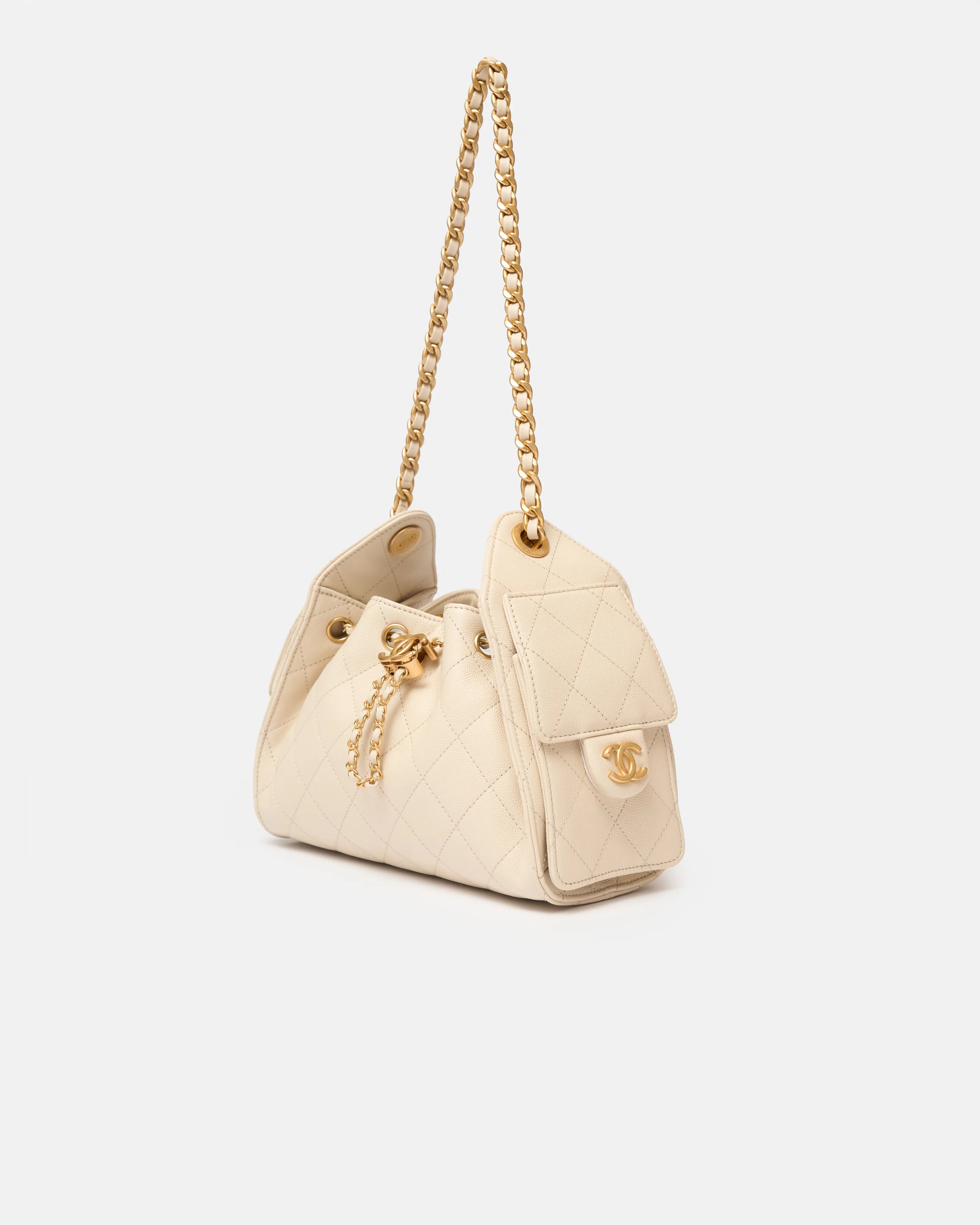Chanel 25 shoulder bag in beige color and grained calfskin material in GHW 