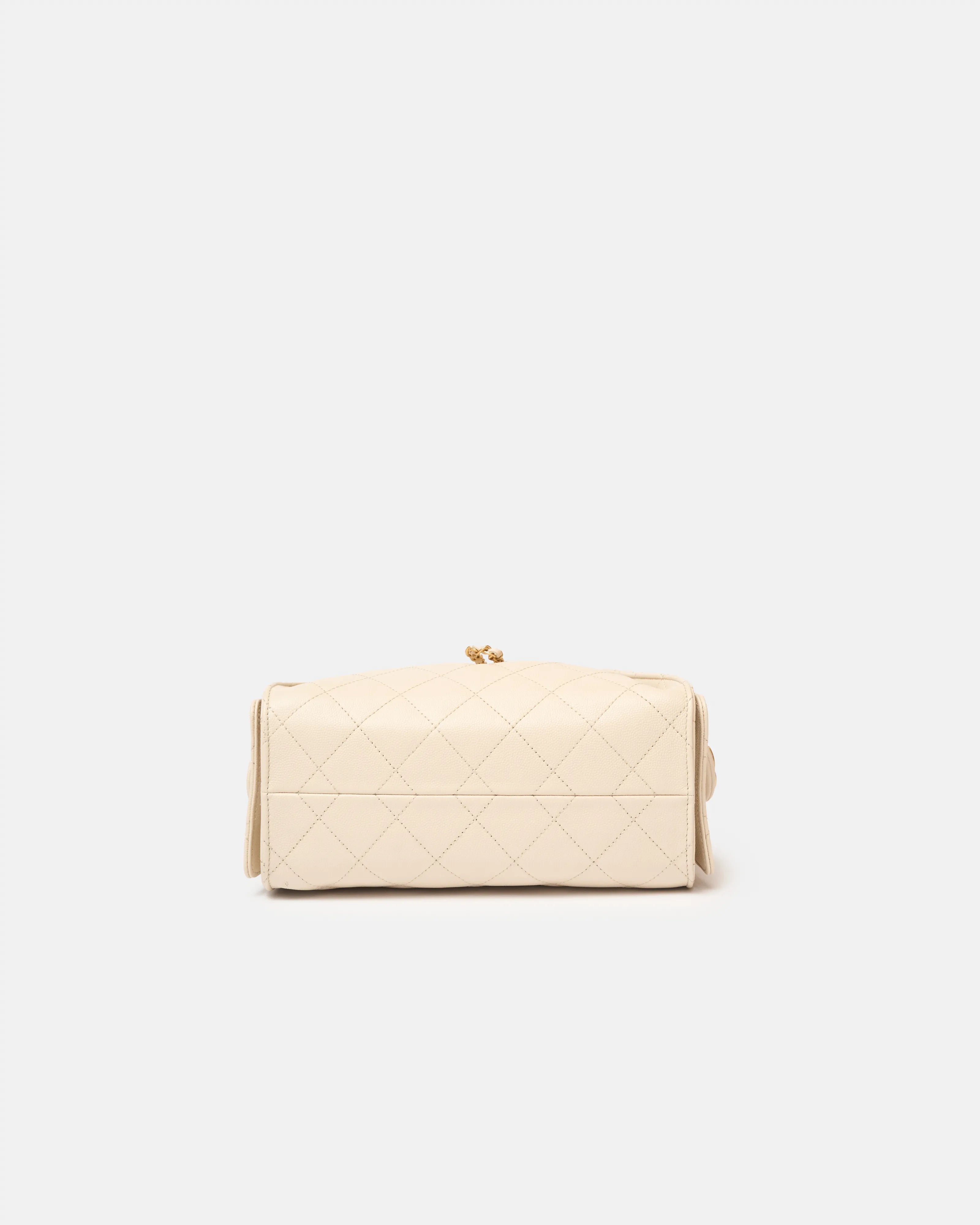 Chanel 25 shoulder bag in beige color and grained calfskin material in GHW 