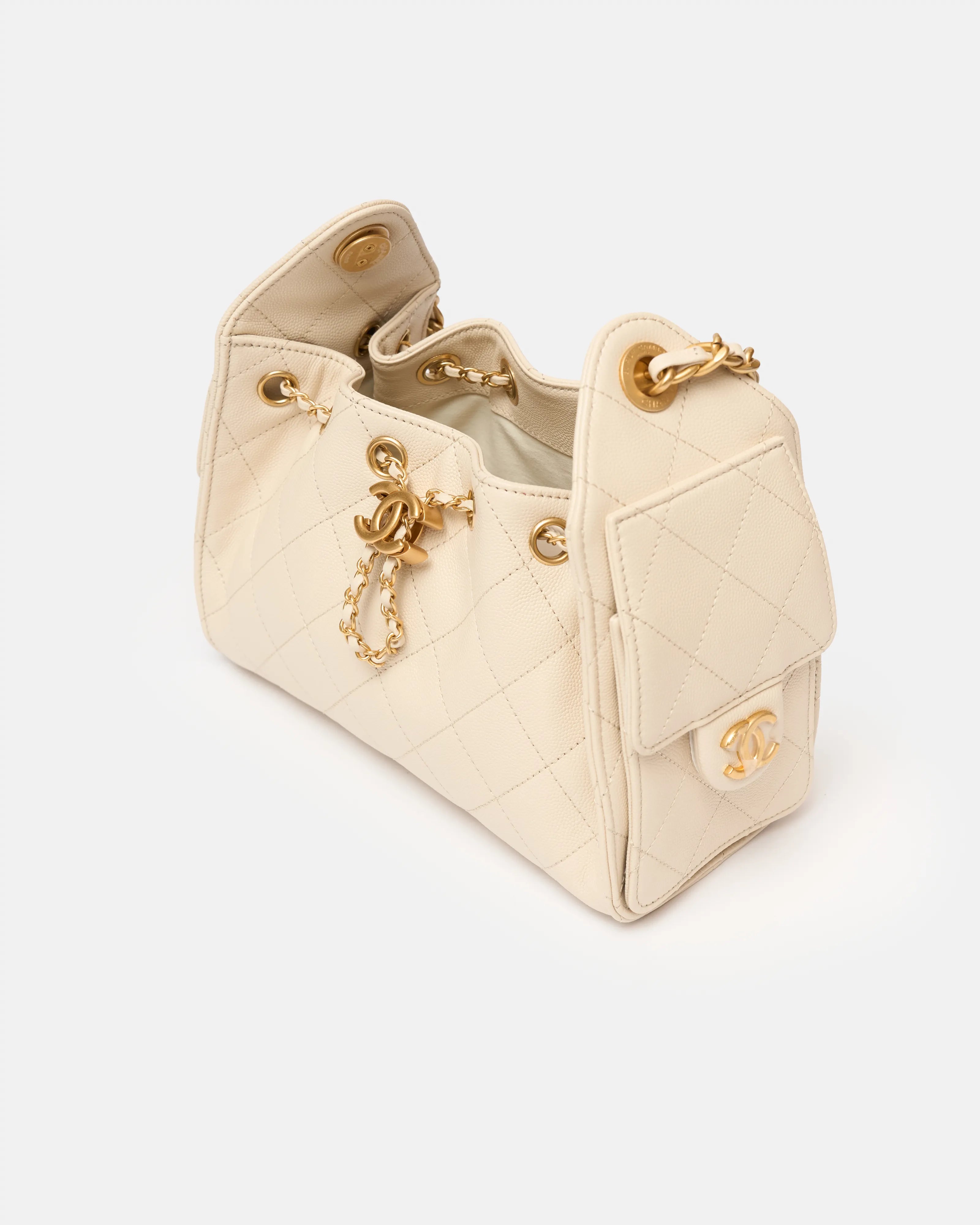 Chanel 25 shoulder bag in beige color and grained calfskin material in GHW 