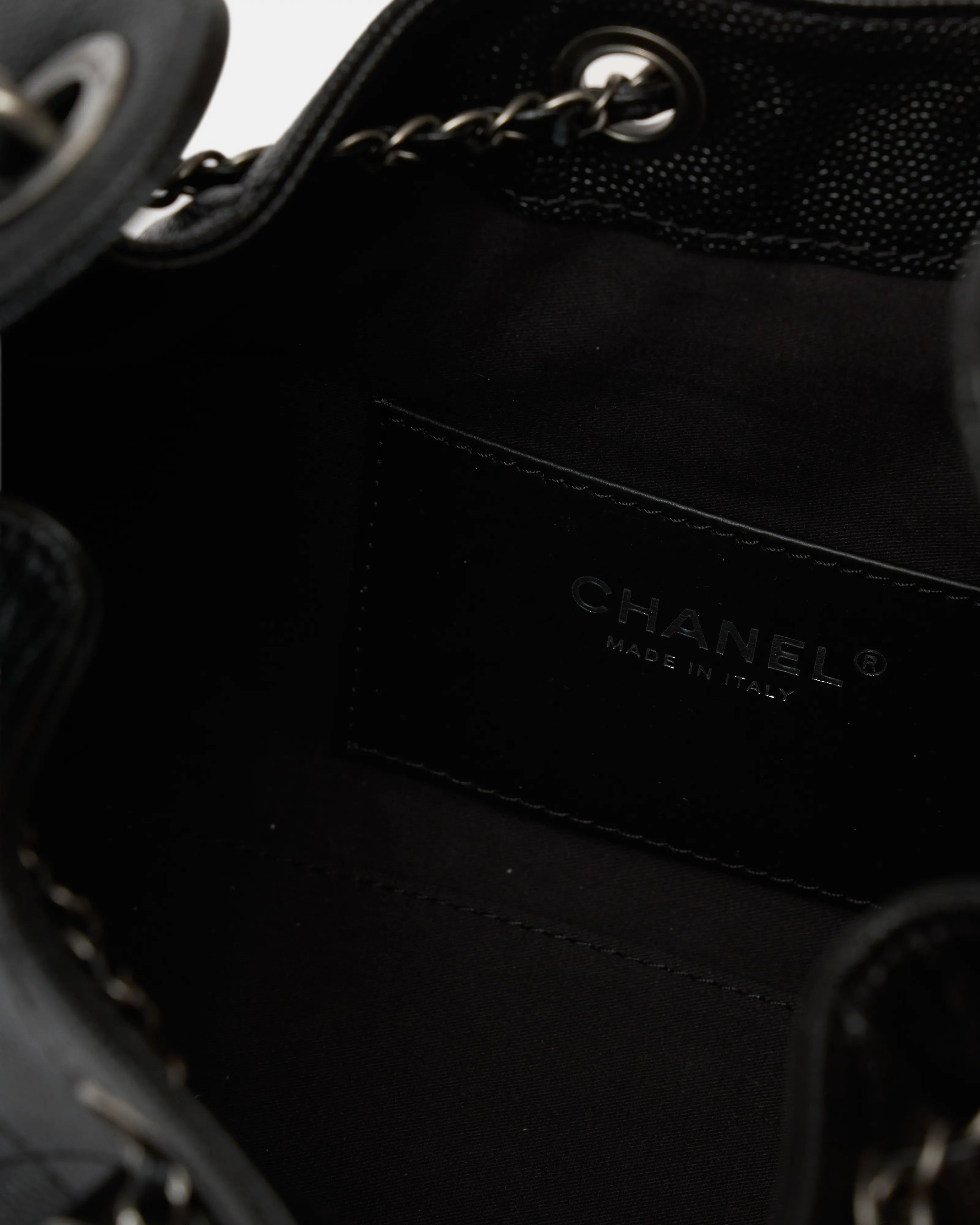 Chanel 25 shoulder bag in black color and grained calfskin material in PHW 