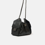 Chanel 25 shoulder bag in black color and grained calfskin material in PHW 
