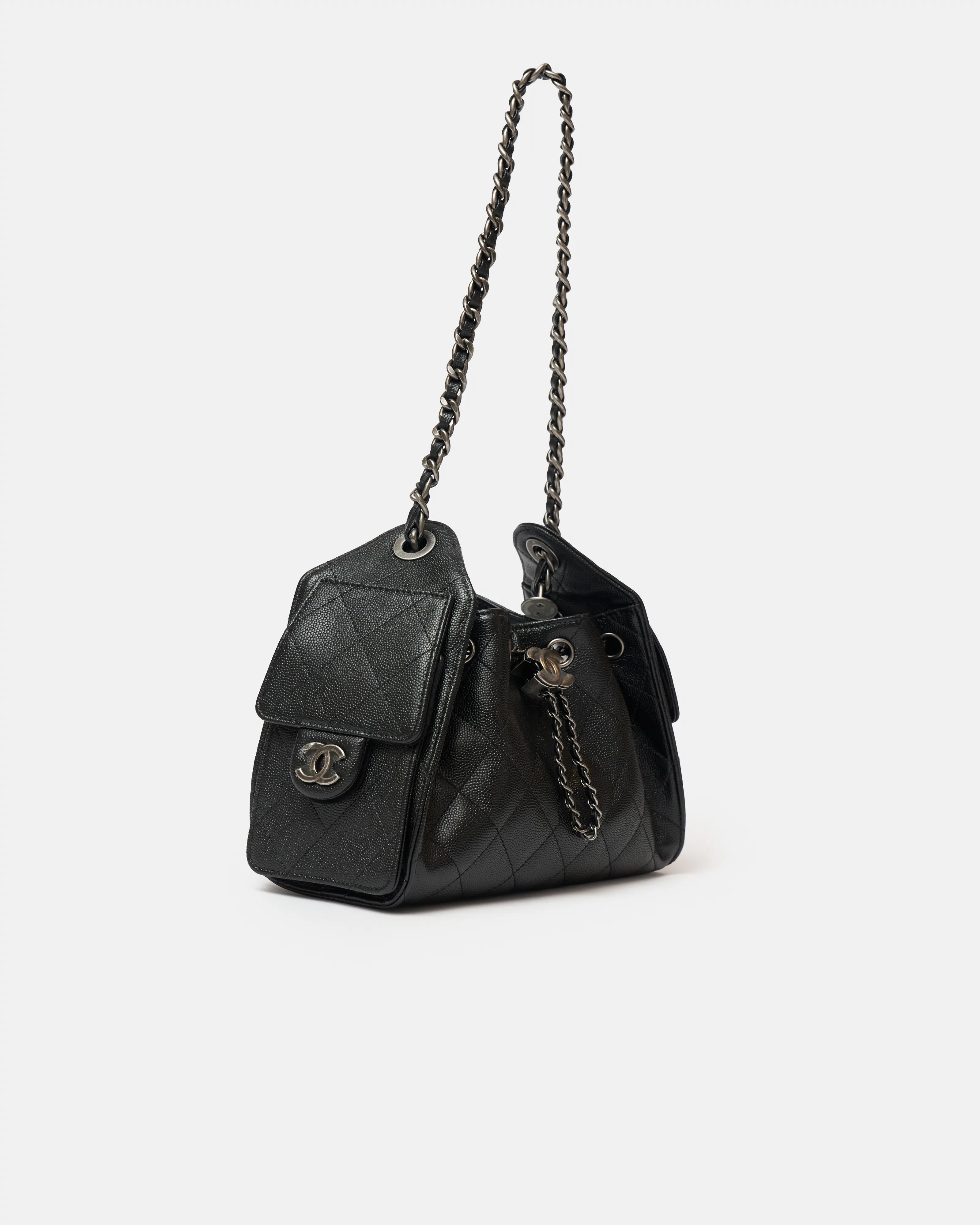 Chanel 25 shoulder bag in black color and grained calfskin material in PHW 