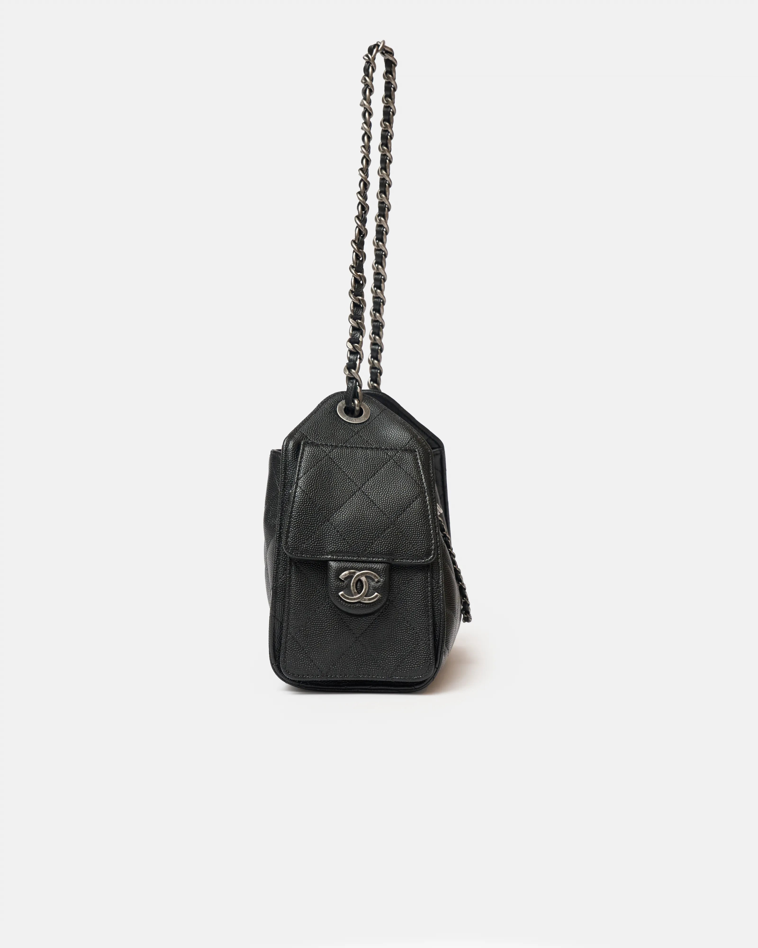 Chanel 25 shoulder bag in black color and grained calfskin material in PHW 