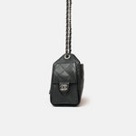 Chanel 25 shoulder bag in black color and grained calfskin material in PHW 