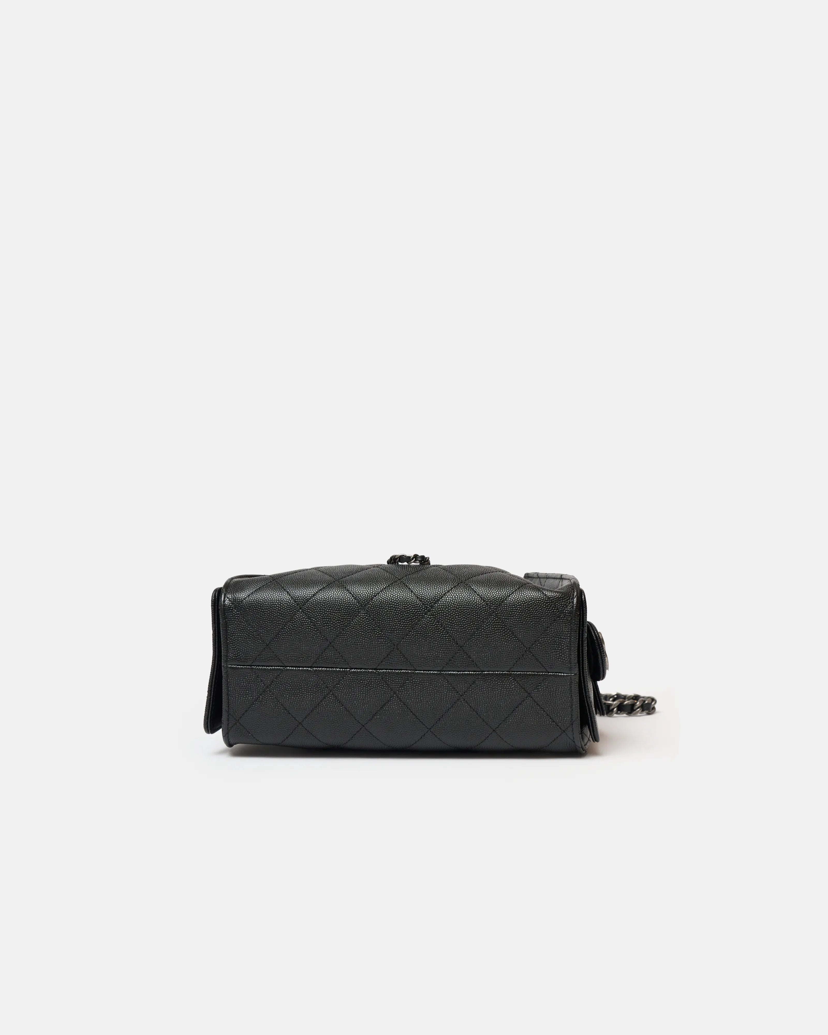 Chanel 25 shoulder bag in black color and grained calfskin material in PHW 