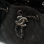 Chanel 25 shoulder bag in black color and grained calfskin material in PHW 