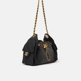 Chanel 25 shoulder bag in black color and washed denim material in GHW 