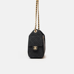Chanel 25 shoulder bag in black color and washed denim material in GHW 