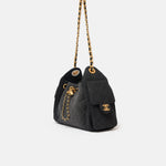 Chanel 25 shoulder bag in black color and washed denim material in GHW 