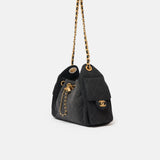 Chanel 25 shoulder bag in black color and washed denim material in GHW 