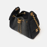 Chanel 25 shoulder bag in black color and washed denim material in GHW 