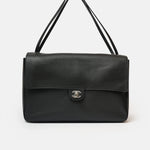 Chanel maxi flap shoulder bag in black color and grained calfskin material in PHW 