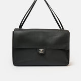 Chanel maxi flap shoulder bag in black color and grained calfskin material in PHW 