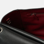 Chanel maxi flap shoulder bag in black color and grained calfskin material in PHW 