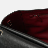 Chanel maxi flap shoulder bag in black color and grained calfskin material in PHW 