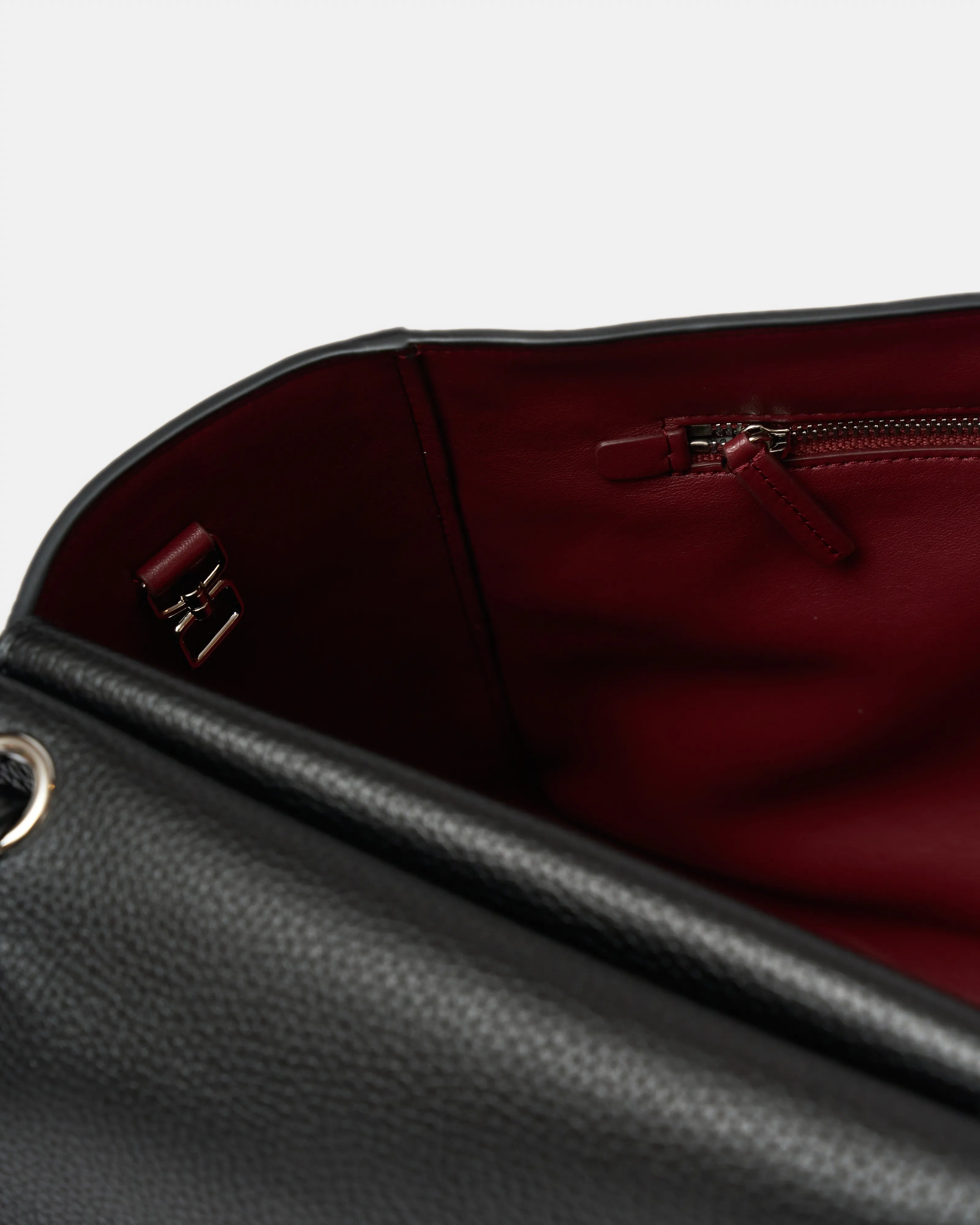 Chanel maxi flap shoulder bag in black color and grained calfskin material in PHW 