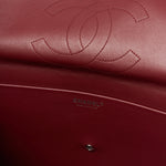 Chanel maxi flap shoulder bag in black color and grained calfskin material in PHW 