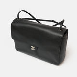Chanel maxi flap shoulder bag in black color and grained calfskin material in PHW 