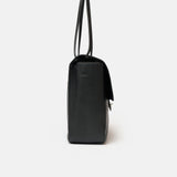 Chanel maxi flap shoulder bag in black color and grained calfskin material in PHW