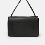 Chanel maxi flap shoulder bag in black color and grained calfskin material in PHW 