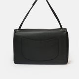 Chanel maxi flap shoulder bag in black color and grained calfskin material in PHW 