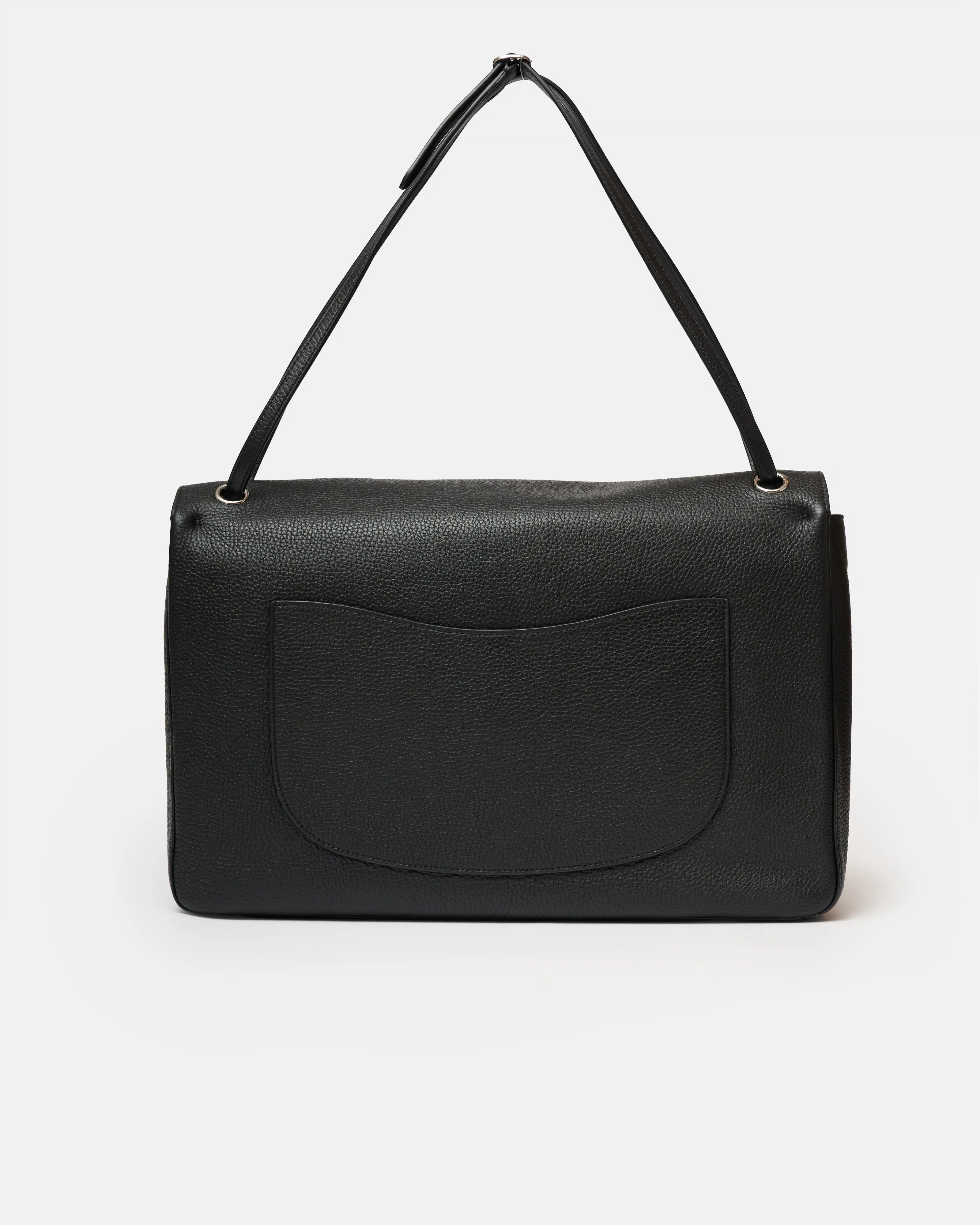Chanel maxi flap shoulder bag in black color and grained calfskin material in PHW 