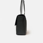 Chanel maxi flap shoulder bag in black color and grained calfskin material in PHW 