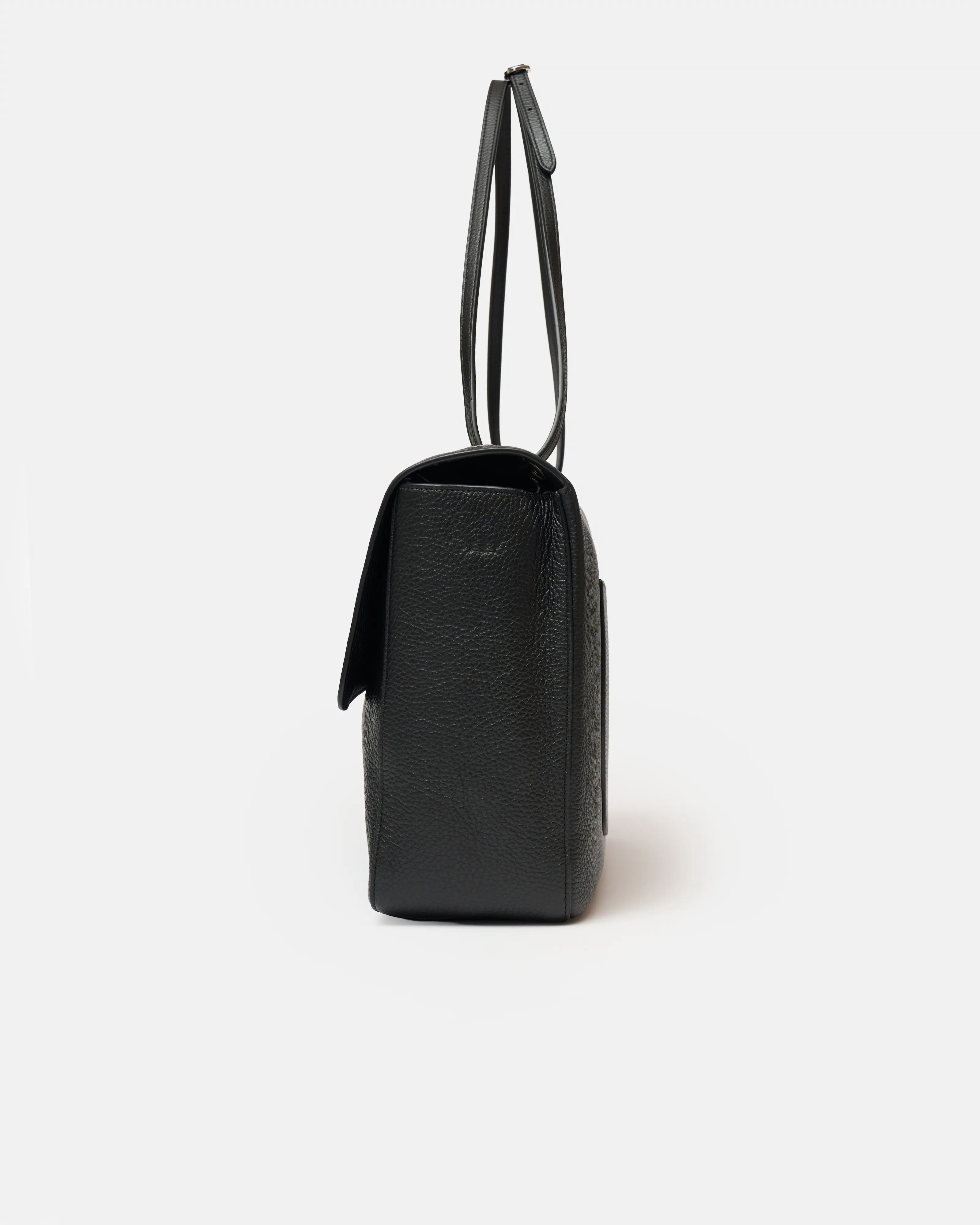Chanel maxi flap shoulder bag in black color and grained calfskin material in PHW 