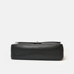 Chanel maxi flap shoulder bag in black color and grained calfskin material in PHW 