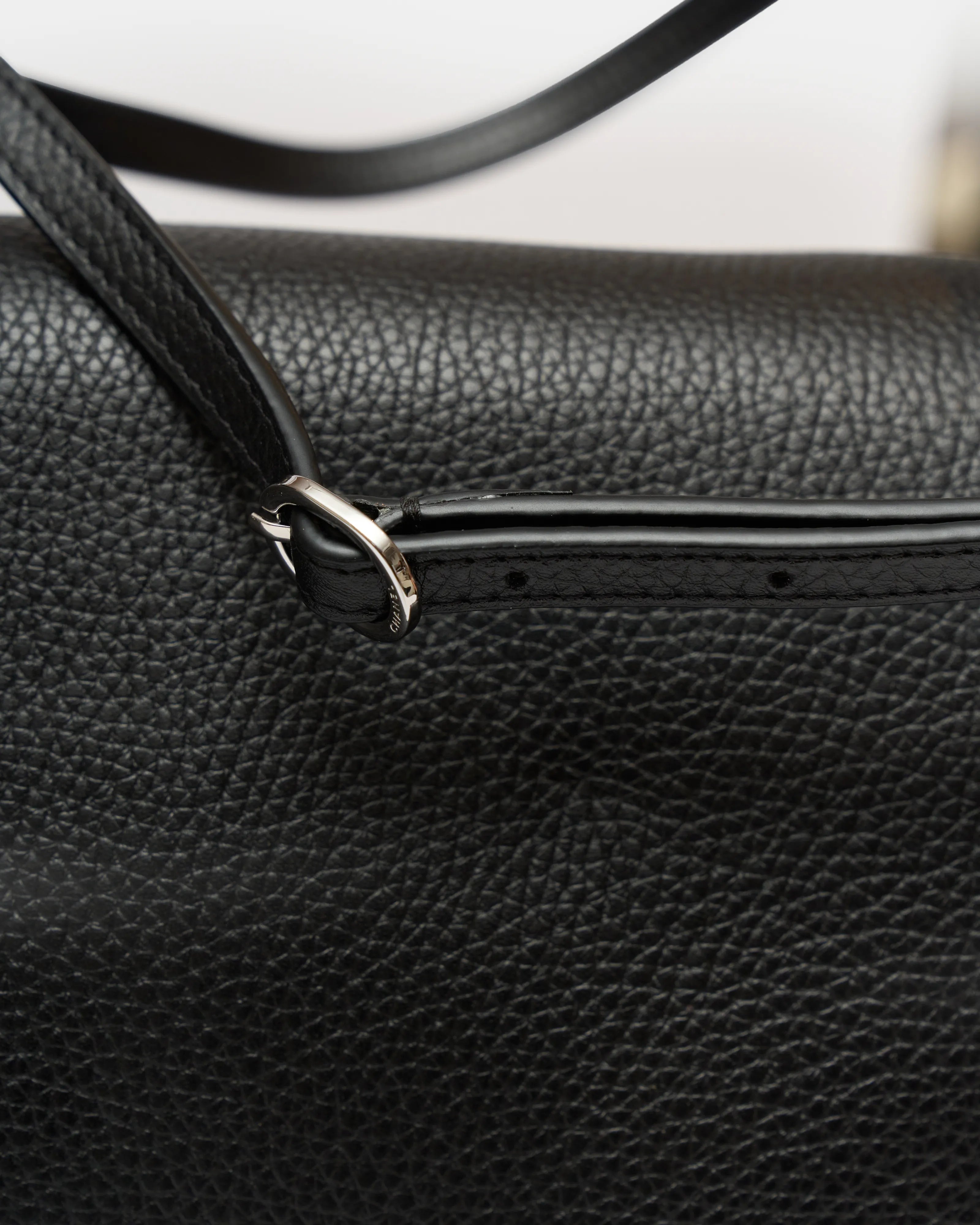 Chanel maxi flap shoulder bag in black color and grained calfskin material in PHW 