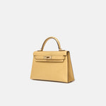 Hermès Mini Kelly 20 Dore Chèvre Chamkilight Permabrass