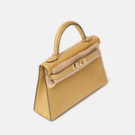 Hermès Mini Kelly 20 Dore Chèvre Chamkilight Permabrass