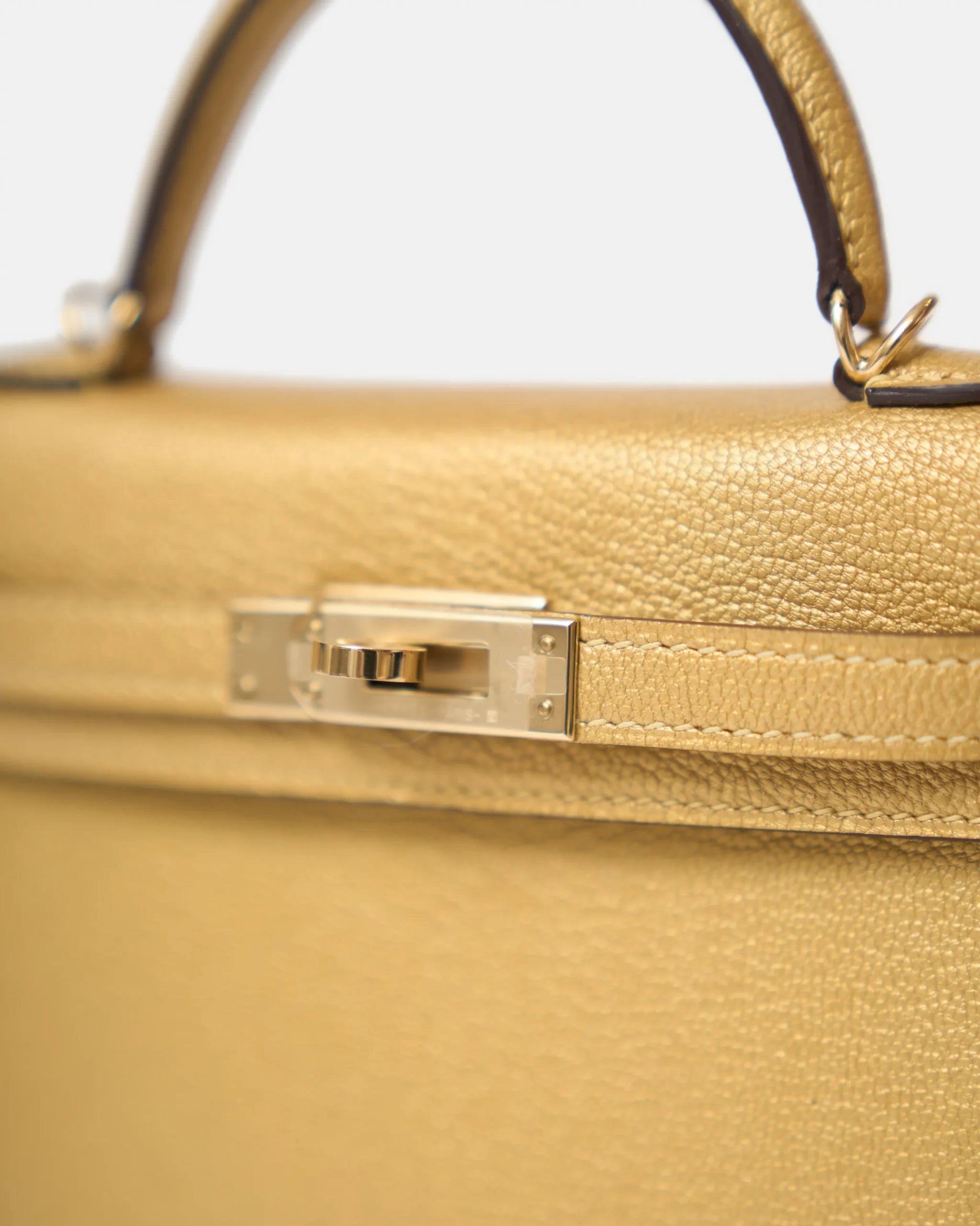 Hermès Mini Kelly 20 Dore Chèvre Chamkilight Permabrass