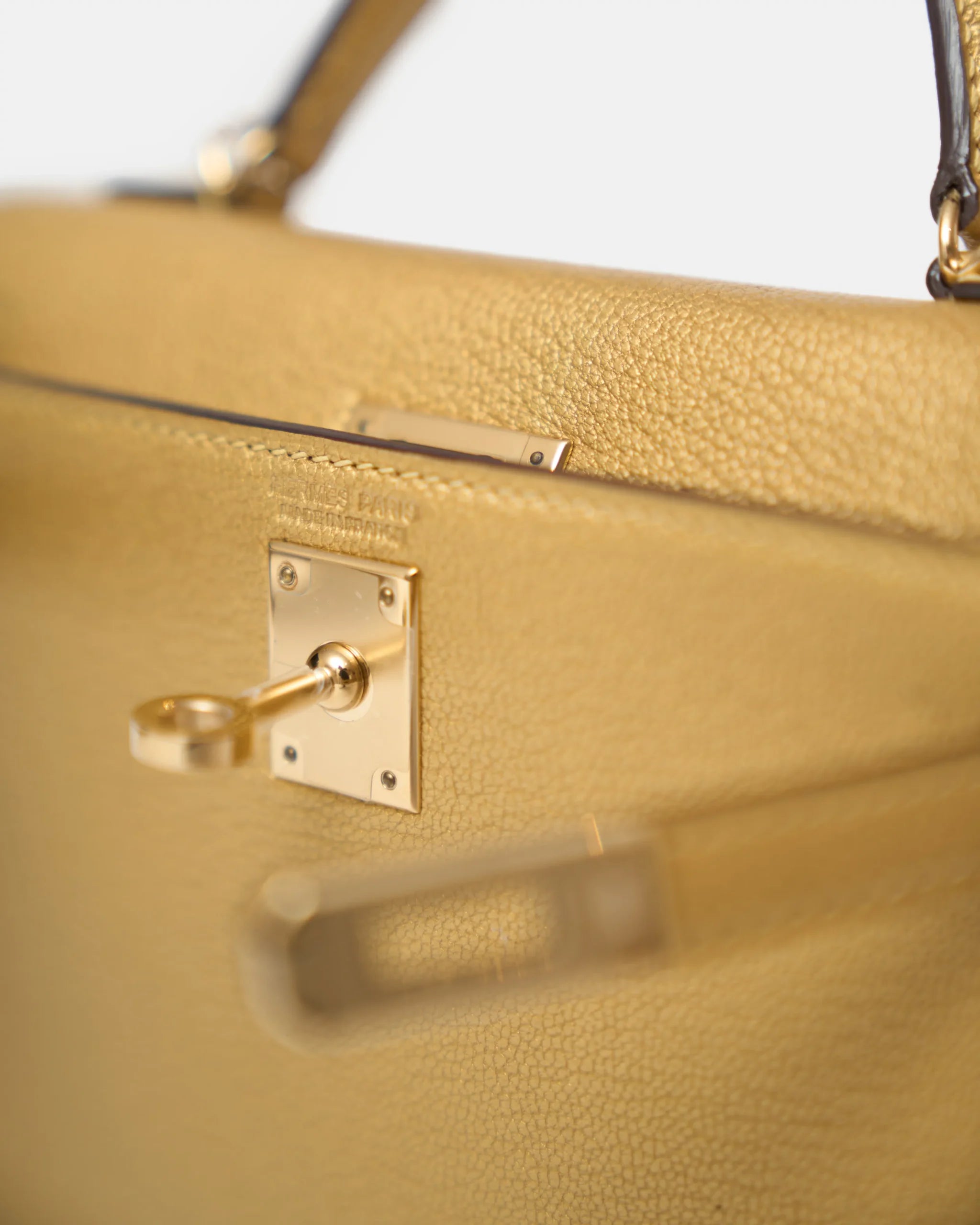 Hermès Mini Kelly 20 Dore Chèvre Chamkilight Permabrass