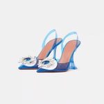 Amina Muaddi Rosie Glass PVC transparent blue slingback pumps with crystal buckle detail