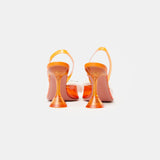 Amina Muaddi Rosie Glass PVC orange transparent slingback heels with crystal bow detail