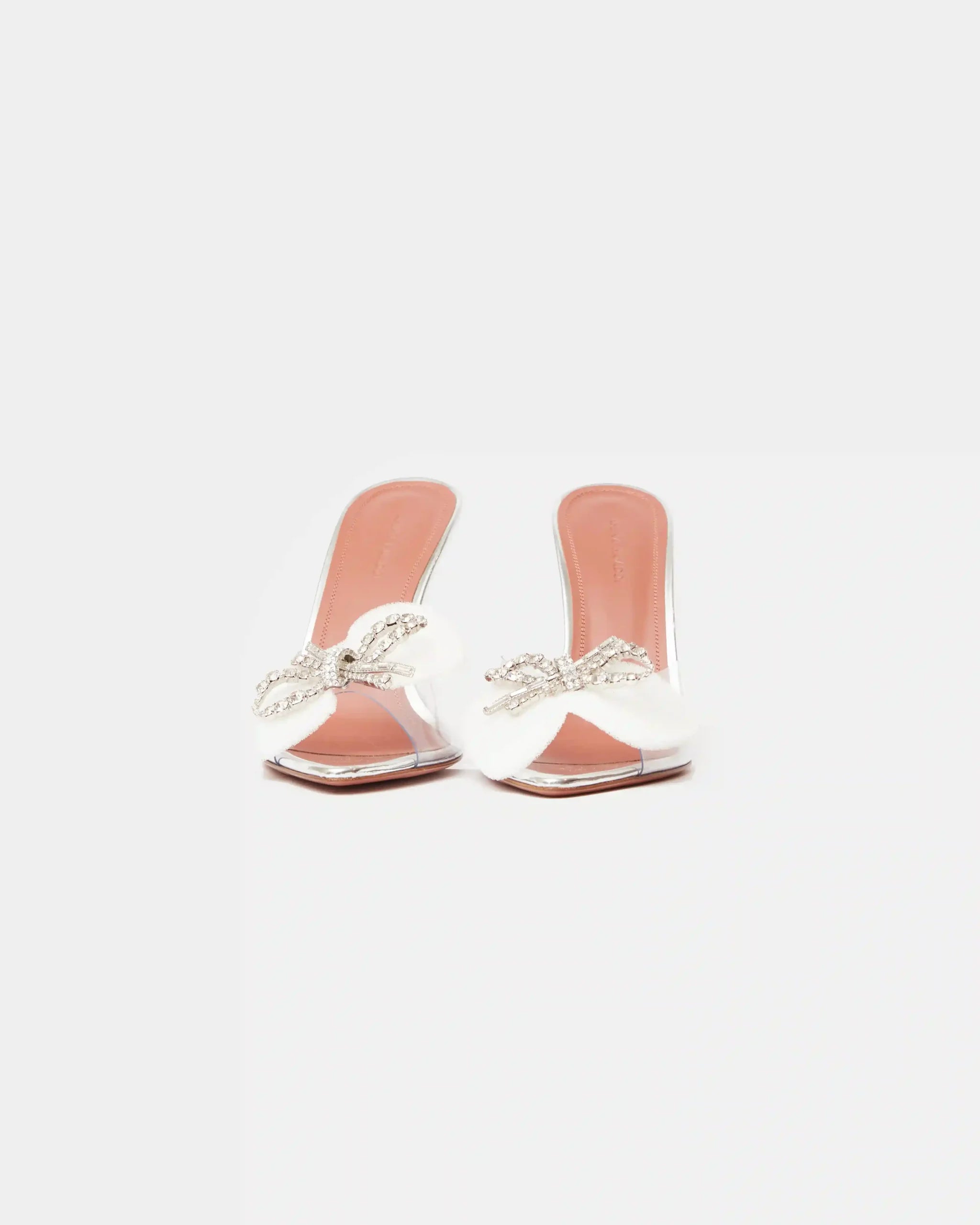 Amina Muaddi Rosie Glass PVC transparent heeled slippers with rhinestone bow detail